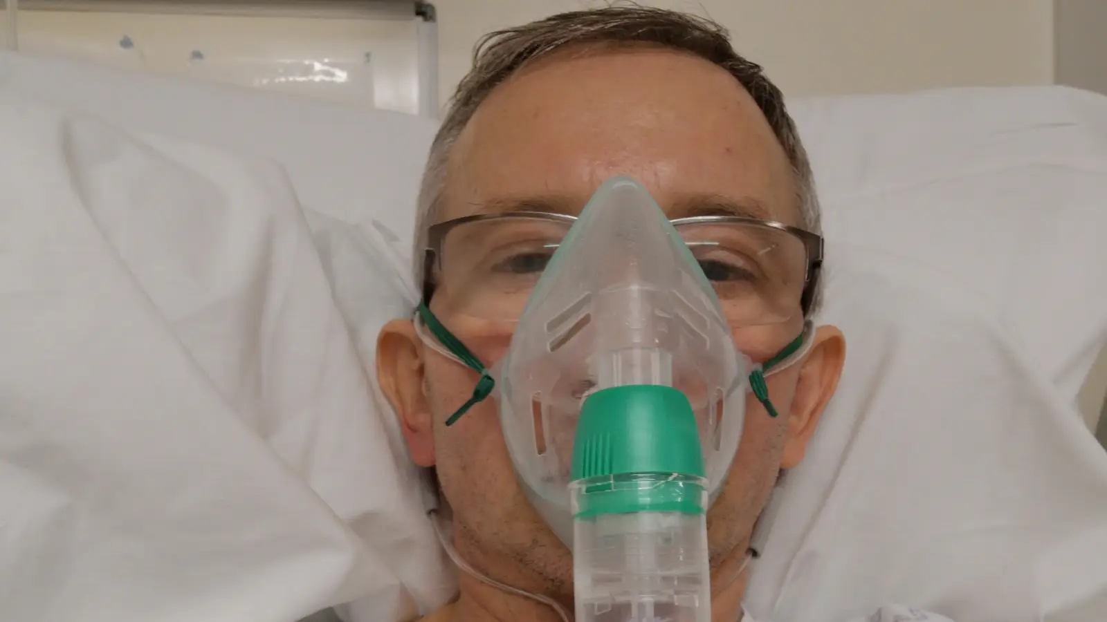 The blog author receiving oxygen support while recovering after surgery in a clinical environment.