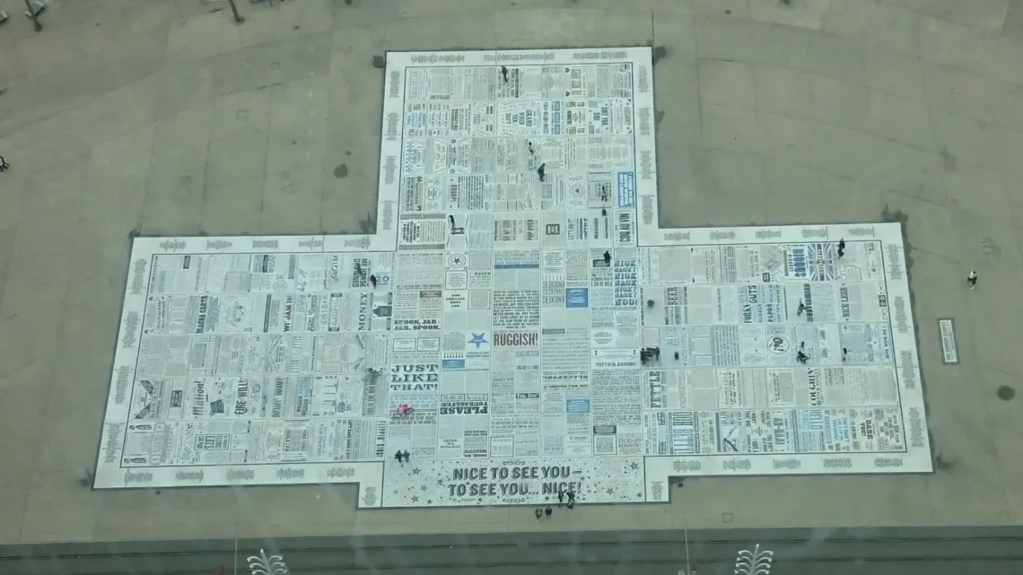 View from Blackpool Tower of the seafront with a giant newspaper – a unique bird's-eye view of street art in England