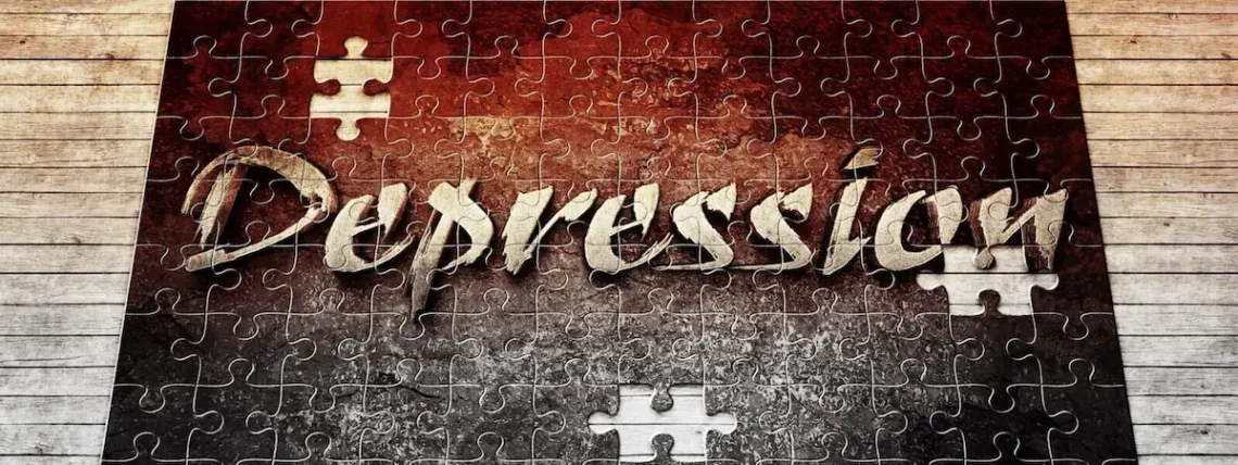 A jigsaw puzzle showing the word “Depression”, with missing pieces symbolising a mind struggling and incomplete.