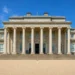 Front elevation of Shugborough Mansion at Shugborough Estate in Staffordshire, viewed from the main forecourt with its grand neoclassical portico and columns.